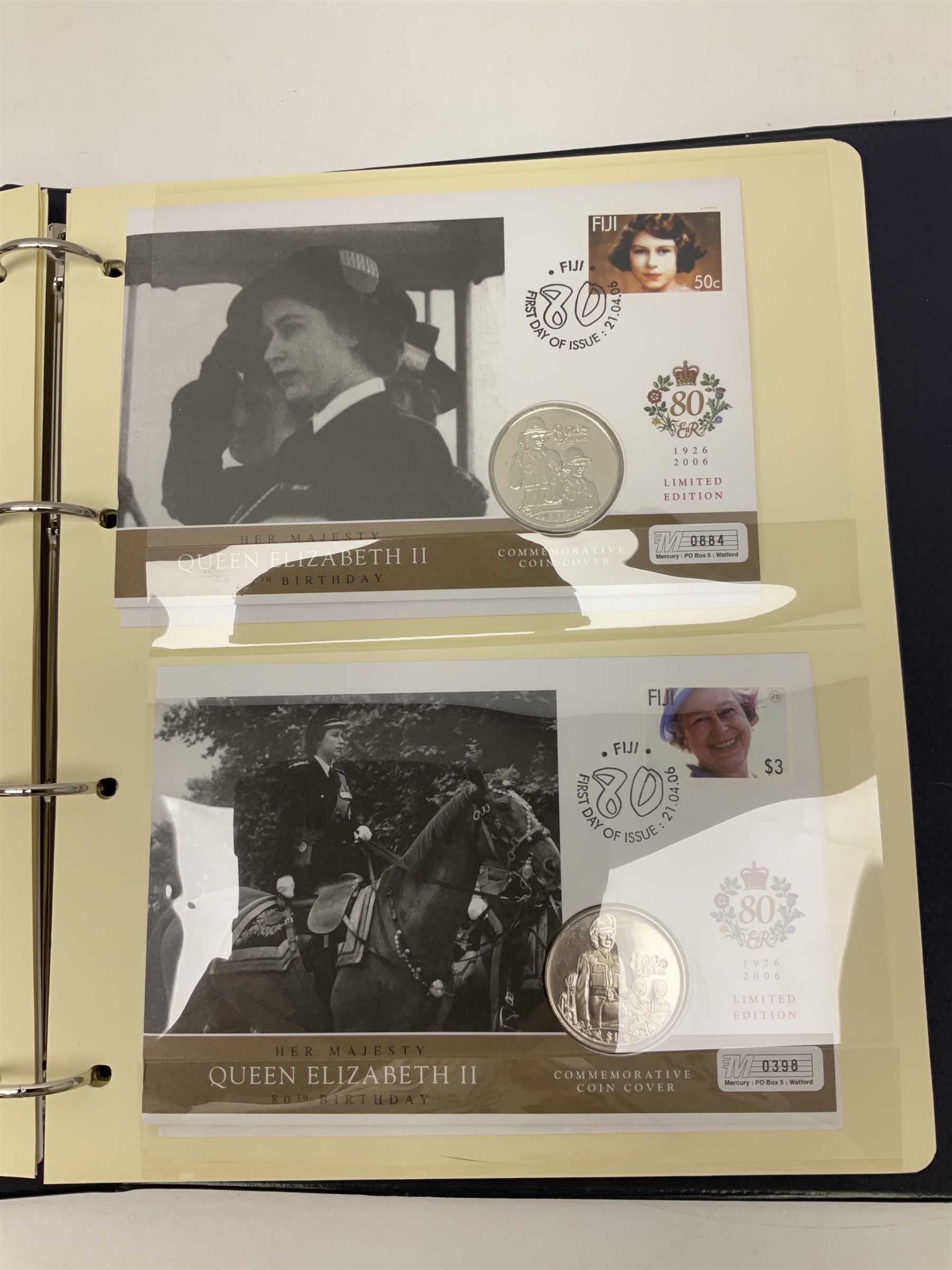 Stamp and coin covers, including 2006 'Her Majesty Queen Elizabeth II 80th Birthday' containing five pounds coin, first day covers relating to Diana Princess of Wales etc, housed in a ring binder folder