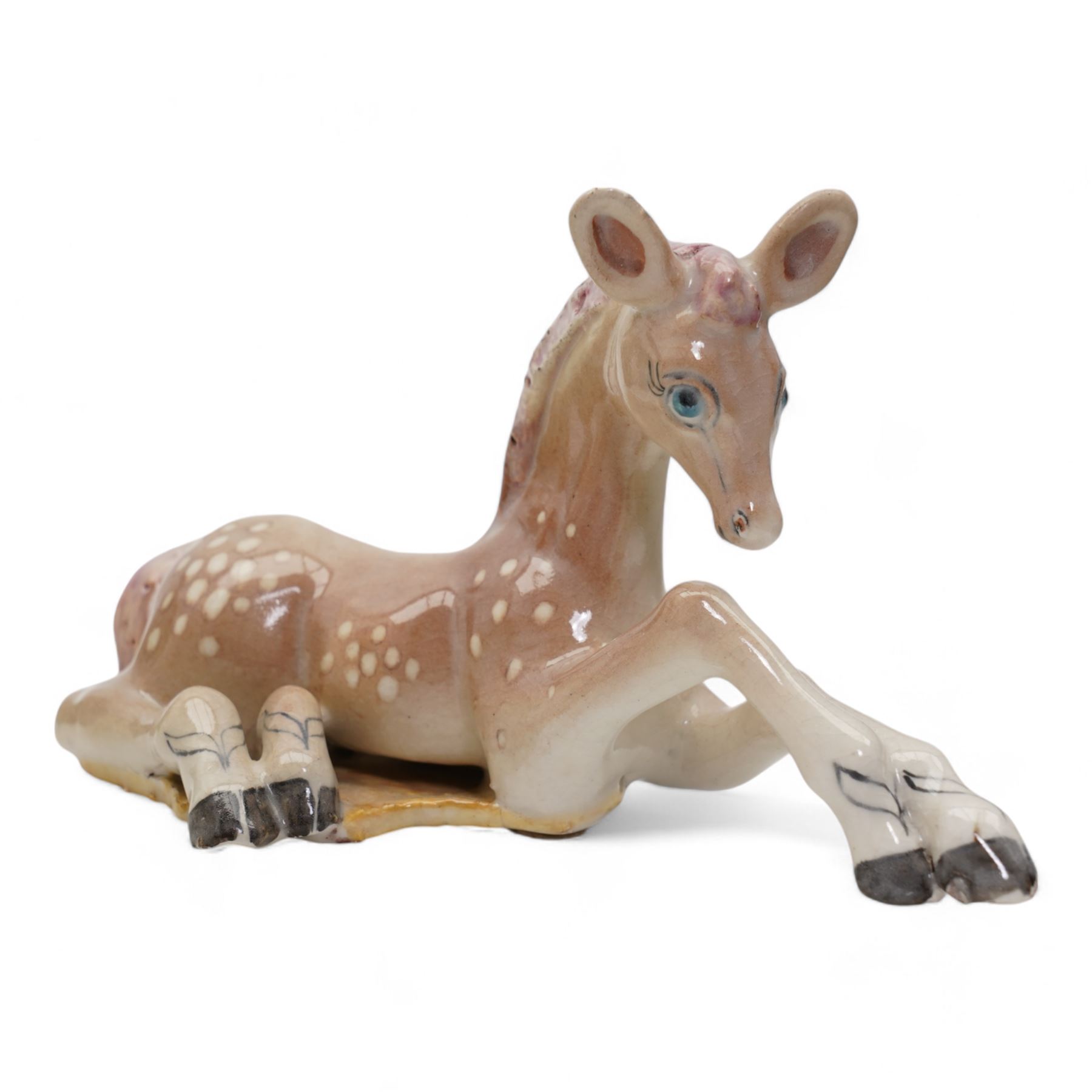 Four Royal Doulton figures comprising 'The Professor' HN2281, 'Schoolmarm' HN2223, 'Darling' HN1319 and 'Top o' the Hill' HN1849, together with a Royal Worcester figure and a model of a foal by Basil Matthews (6)