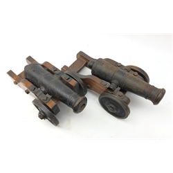  Pair of early 20th century Stafsjo Bruk signal canon, with 22cm tapering iron barrels on pine carriages with named cast wheels, L36cm (2)  