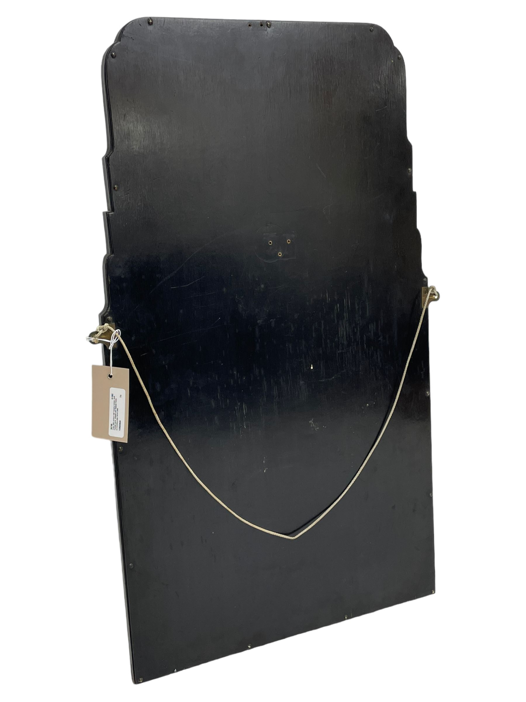 Early 20th century wall hanging tortoise shell framed mirror, of rectangular form, the upper half of the frame shaped and stepped surrounding a plain mirror plate