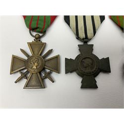 Four French medals - St. Helena medal with bust of Napoleon to obverse and inscription to reverse 'Campagnes de 1792 a 1815. A ses compagnons de gloire sa derniere pensée Ste. Hélène 5 Mai 1821', established by Emperor Napoleon III in 1857; two WW2 Croix-de-Guerre; and WW2 Croix-du-Combattant; all with ribbons (4)
