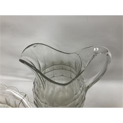 Large glass jug and bowl together with glass dressing table set to include lidded jars, candlesticks and tray, jug H30cm