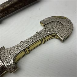 Moroccan jambiya dagger with 24.5cm plain curved blade stamped LONDON to the ricasso area, the hilt and scabbard overlaid with plain sheet brass to the back and ornate silver coloured metal to the front; waisted grip and arched pommel; two pyramid mounts to the scabbard L41cm overall; large billhook with curving blade and stacked leather washer grip; and a reproduction halberd blade (3)