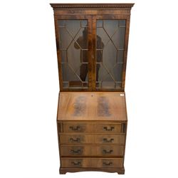 Reproduction mahogany bureau bookcase, the glazed bookcase over fall front bureau fitted with four drawers, on bracket feet