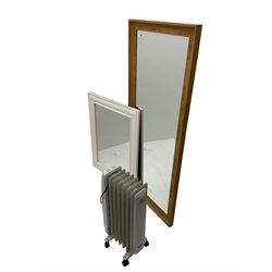 Hardwood framed wall mirror with bevelled plate; and small white painted framed wall mirror; and carved and painted framed wall mirror 