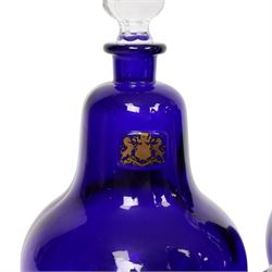 Set of four 20th century Royal Pharmaceutical Society blue glass bottles, of bellied form with clear cut glass spire stopper, each body bearing gilt label in Latin: VIN:ACET:, VIN:ANTIM:, VIN:XERIC:, and VIN:FERR:, and gilt Royal Pharmaceutical Society crest to neck, H25cm

Provenance: From the collection of the family of Peter Green, a practising pharmacist whose career spanned the mid to late 20th century. During his professional life he managed pharmacies in Yeovil, Somerset, and later Selles Chemist in Filey, North Yorkshire, before purchasing and running his own business, Peter Green Pharmacy, located in the Market Place, Malton. The bottles were displayed as part of the traditional shop fittings in both the Filey and Malton pharmacies and were retained as part of his collection.