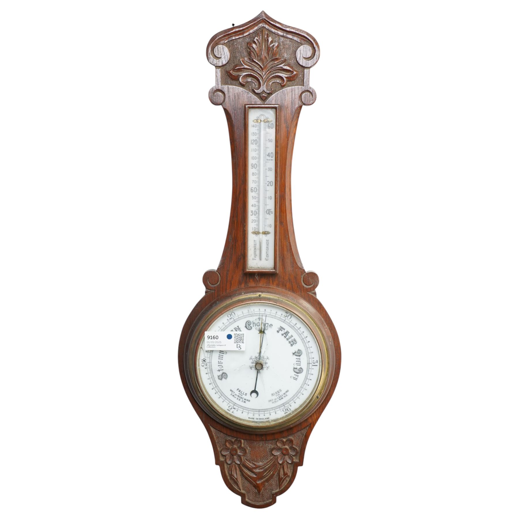 Aneroid barometer and thermometer in carved oak case
