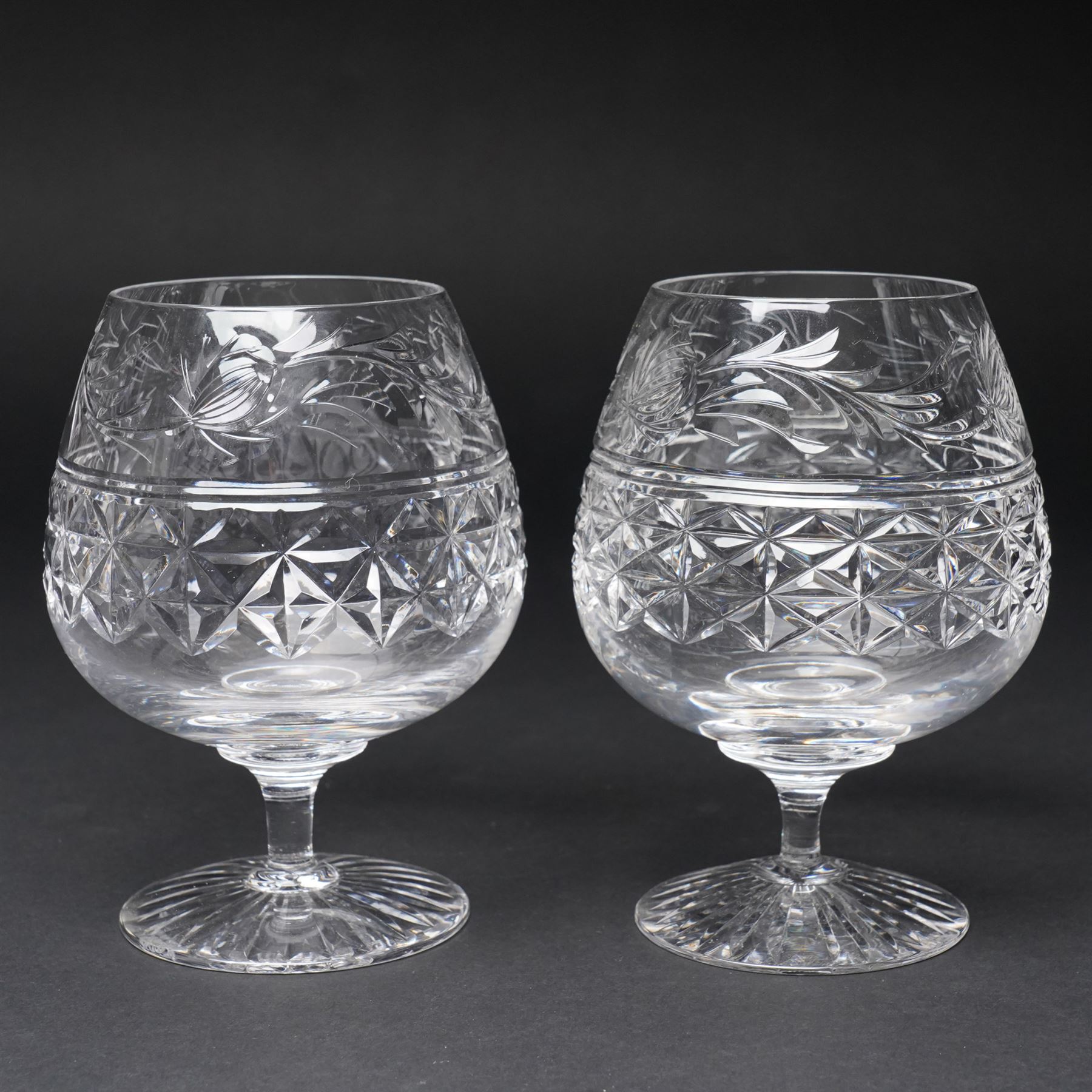 Quantity of Stuart crystal including six Cheltenham whisky tumblers, six claret glasses, six water tumblers and decanter with similar Stuart glass including sherry glasses, two brandy balloons, water jug etc