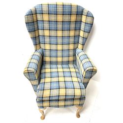 Wingback armchair upholstered in chequered fabric, cabriole feet
