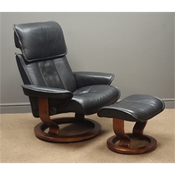  Ekornes Stressless swivel reclining armchair with matching footstool upholstered in black leather  