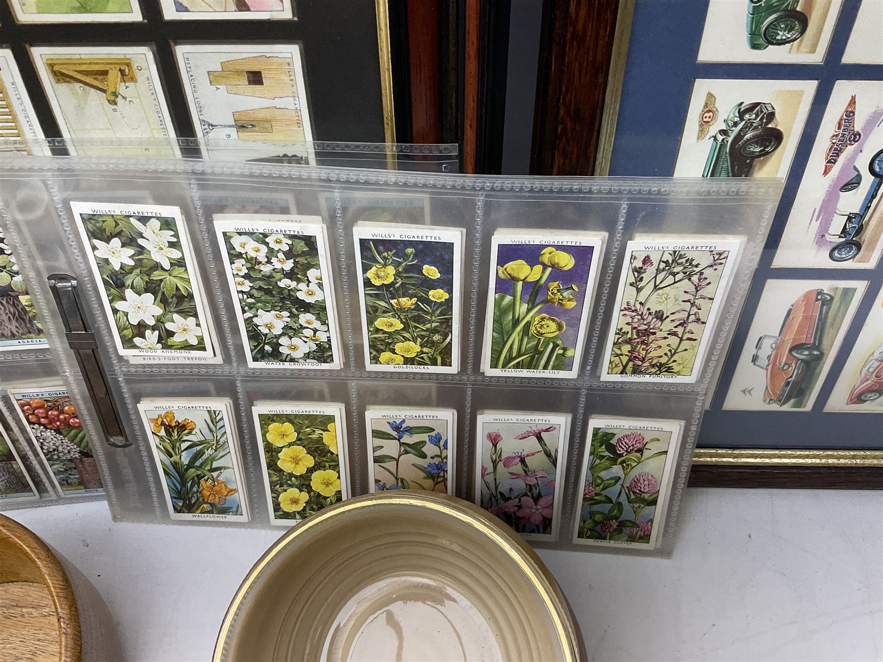 Quantity of cigarette cards to include three frames, and quantity of marble and agate eggs, turned wood bowls etc