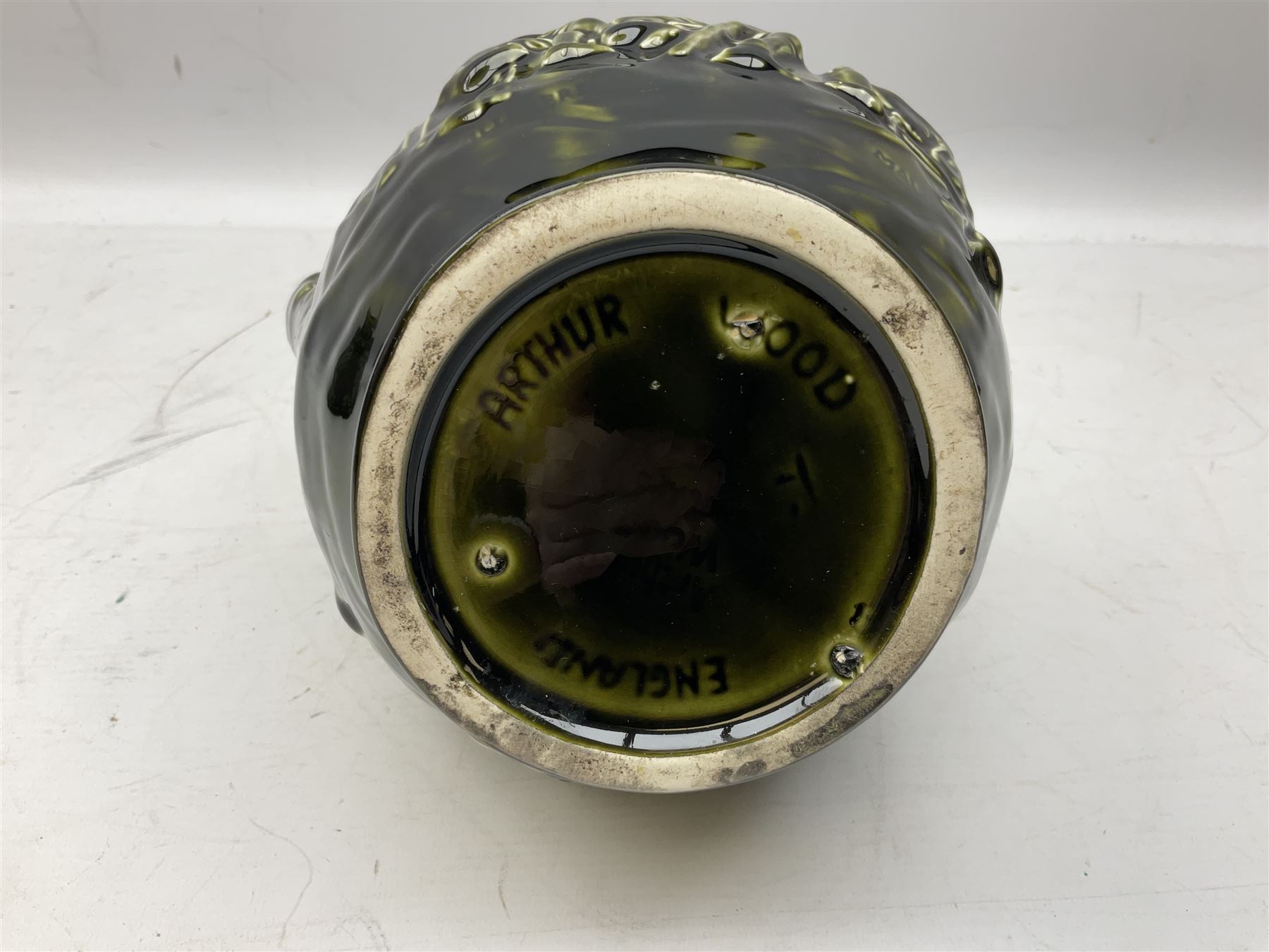 Three jardinières comprising West German Gerz example decorated in relief, Doulton Slaters example with frilled everted rim and a majolica example, and a further two Arthur Wood majolica jugs (5)