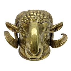 Brass figural inkwell, modelled as a ram's head, the hinged lid lifting to reveal interior with glass liner, raised upon circular spreading base, H11cm W14cm