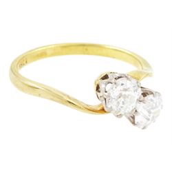 Gold diamond ring, crossover set with two old cut diamonds, stamped 18ct, total diamond weight approx 1.30 carat