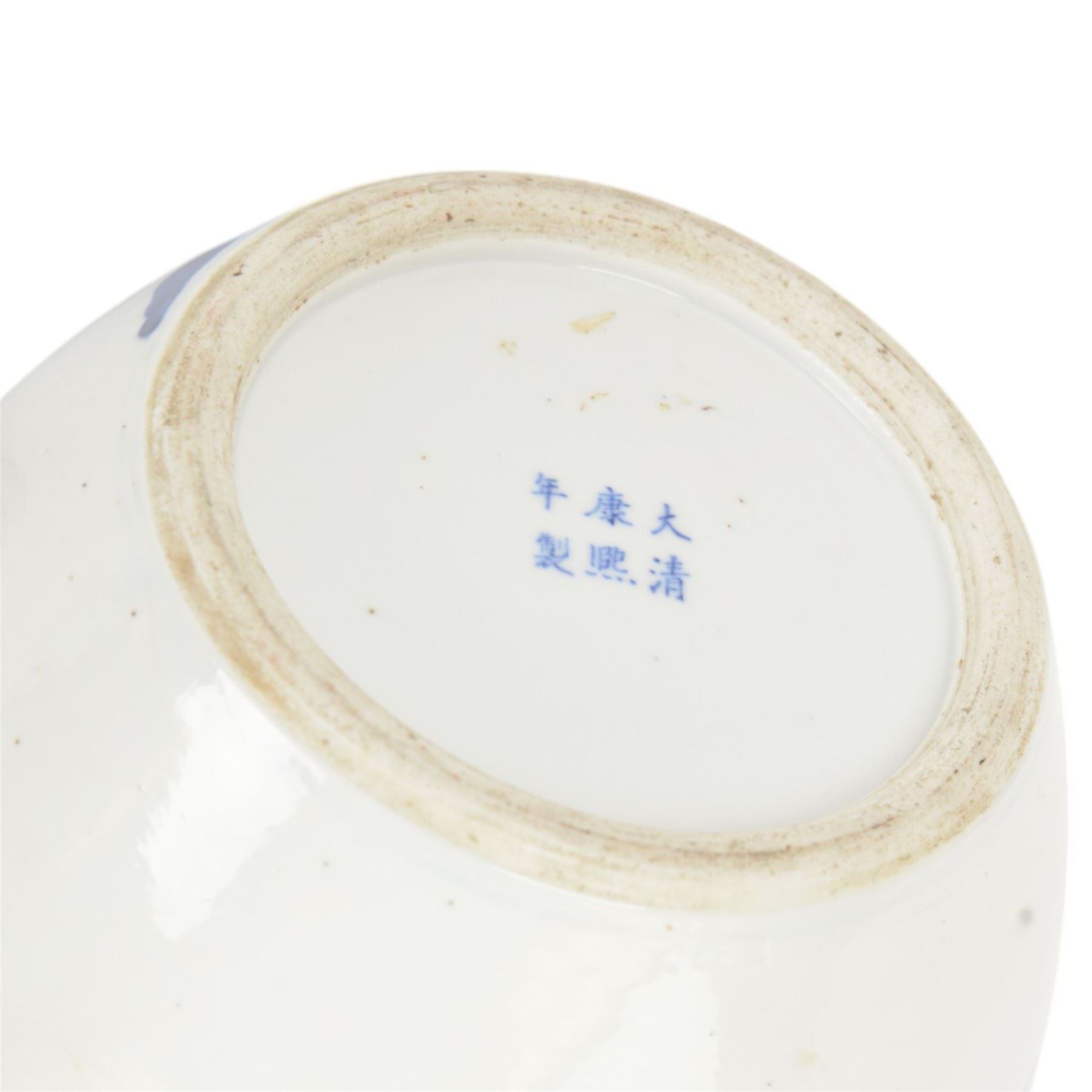 Late 19th century Chinese blue and white ginger jar, of ovoid form with flat topped circular cover, the body decorated with a geisha on reindeer with attendant in a landscape setting, with apocryphal Kangxi mark beneath, H24cm