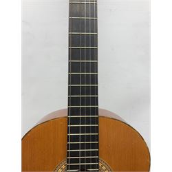 Spanish BM acoustic guitar with mahogany back and sides and spruce top L101cm; in cello carrying case; Roland foot pedal and two Yamaha foot pedals; tin D# organ pipe; folding music stand etc