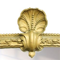 Large Country House late 19th century gilt framed overmantel mirror of arched form, the cartouche and scallop shell pediment over an egg-and-dart and beaded frame, the lower spandrels of scrolling foliate form with acanthus and flower head motifs