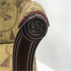  Early 20th century mahogany framed Gainsborough style armchair, upholstered in antique gold fabric featuring dark crimson old rose bouquets with foliate scrolls and tasselled swags, arched cresting rail, out swept arms, square reeded legs joined by cross stretcher, W68cm  
