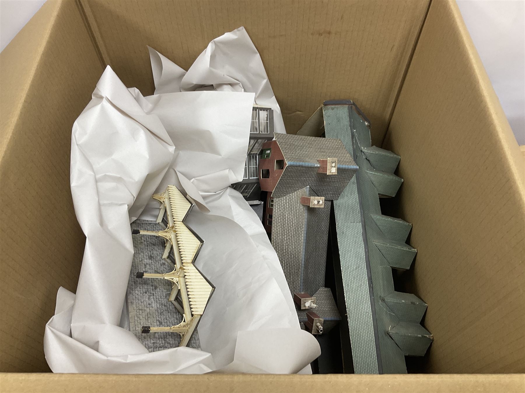 Extensive collection of scratch built buildings for use on ‘00’ gauge model railway layout, small amount of accessories and tools with a quantity of railway magazines and leaflets, in three boxes 