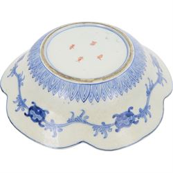 Group of 19th century Japanese Imari porcelain, Meiji period, comprising pair of lobed dishes, decorated stylised reserves and painels in blue and gilt upon a red ground, H6.5cm D21.5cm, a pair of plates of circular lobed form, decorated with a central panel depicting a vase beneath pine branches, and surrounded by panels of flowers and stylised quatrefoil shapes, D21cm, and another similar example painted with a character in underglaze blue to the centre, with character mark beneath, D22cm, each with character marks beneath               