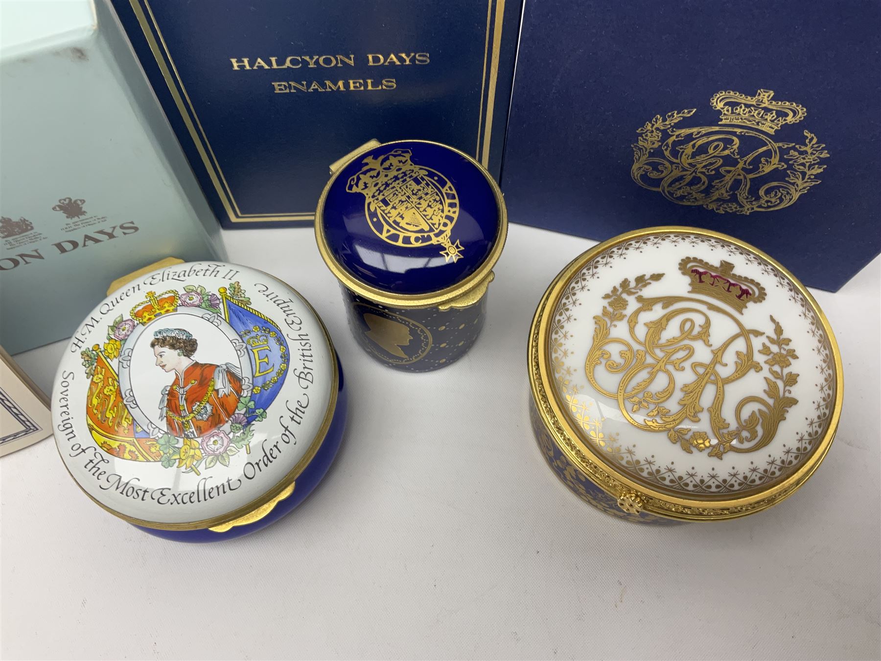 Five Halcyon Days Royal commemorative enamel boxes and one other