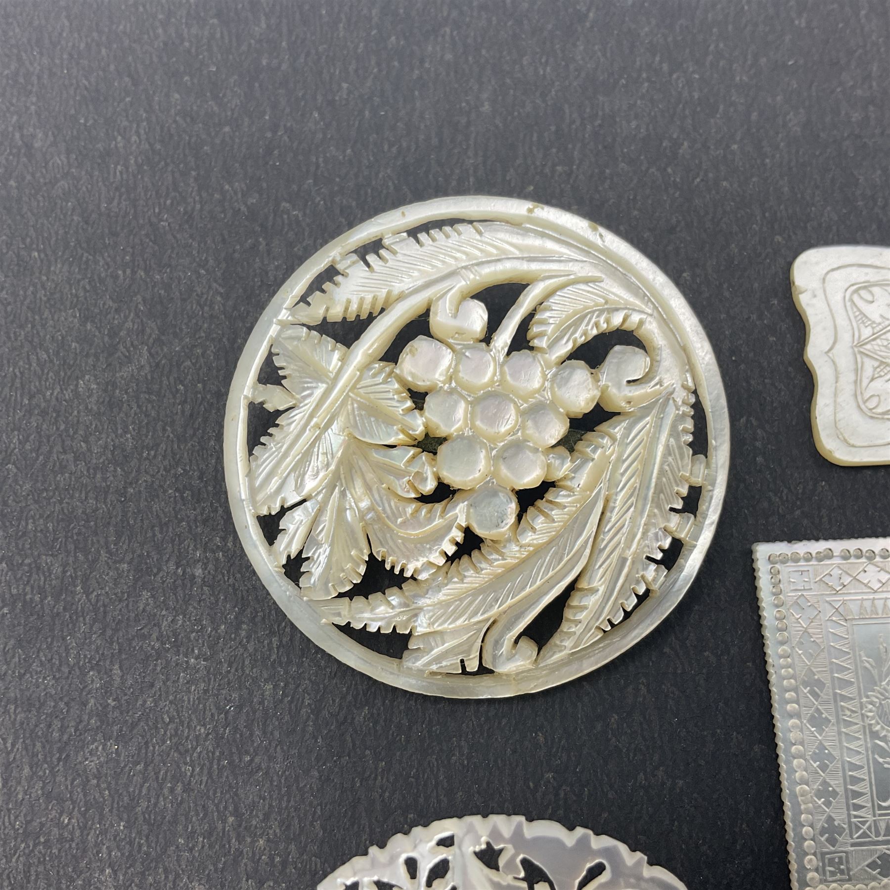 Two silver fruit knives with mother of pearl handles, hallmarked, mother of pearl tokens and similar items 