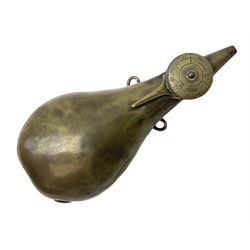 19th century continental brass bottle shaped powder flask, possibly French, unusual dispensing action with lever and revolving gauge; indistinctly inscribed and dated 1852(?) H14.5cm