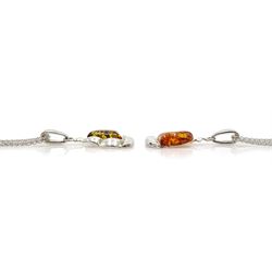 Two silver Baltic amber boat pendant necklaces; one orange and the other green coloured amber, stamped 925 (2)