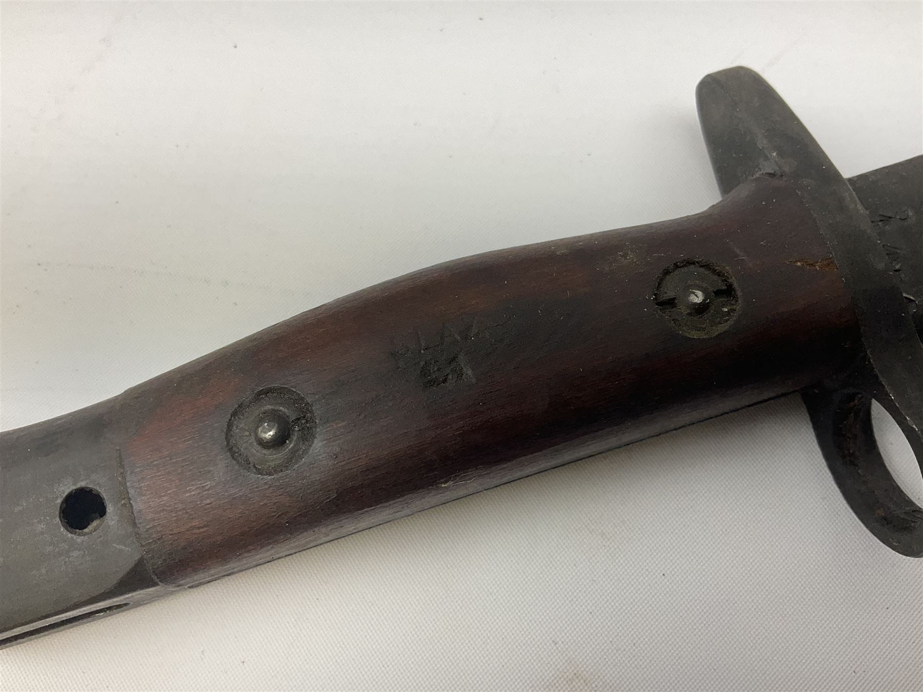 Australian Owen sub-machine gun bayonet, the 25.5cm fullered steel blade marked '53'; in metal bound wooden scabbard marled MA53 L41cm overall