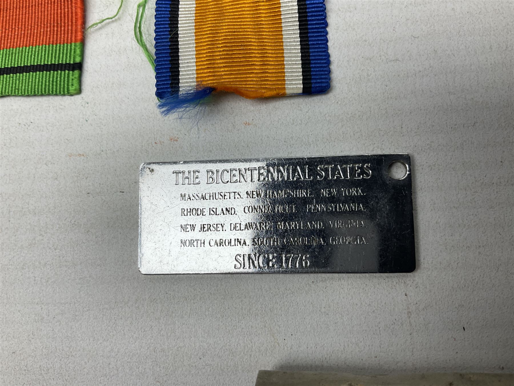 Miscellaneous militaria including two Royal Artillery and one Royal Horse Artillery stable belts; Northamptonshire Regiment trench art brass shell case lighter; unused Matchless Fire-Set; pocket knives and multi-tool; lanyards; oak shield with York & Lancaster crest etc