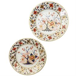 Early 19th century Bloor Derby dinner wares, c.1800-1825, Asian Rose pattern, comprising five small plates, one circular tureen, and three covered surrounding dishes, crossed sword marks in red to base, plates D20cm, circular tureen 24cm  
Provenance: property of a Nobleman