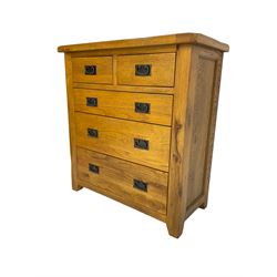 Contemporary oak straight-front chest, fitted with two short over three long graduating drawers, each with wrought metal pull handles