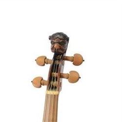 Violin - with a carved Lions head scroll and period style replacement fingerboard and fittings, in a later hard case, no bow, possibly from Germany or Bohemia.
Thought to have originated in the Tyrol region between Austria and Germany this design of scroll was very popular from the late 17th century onwards and well into the 19th century.