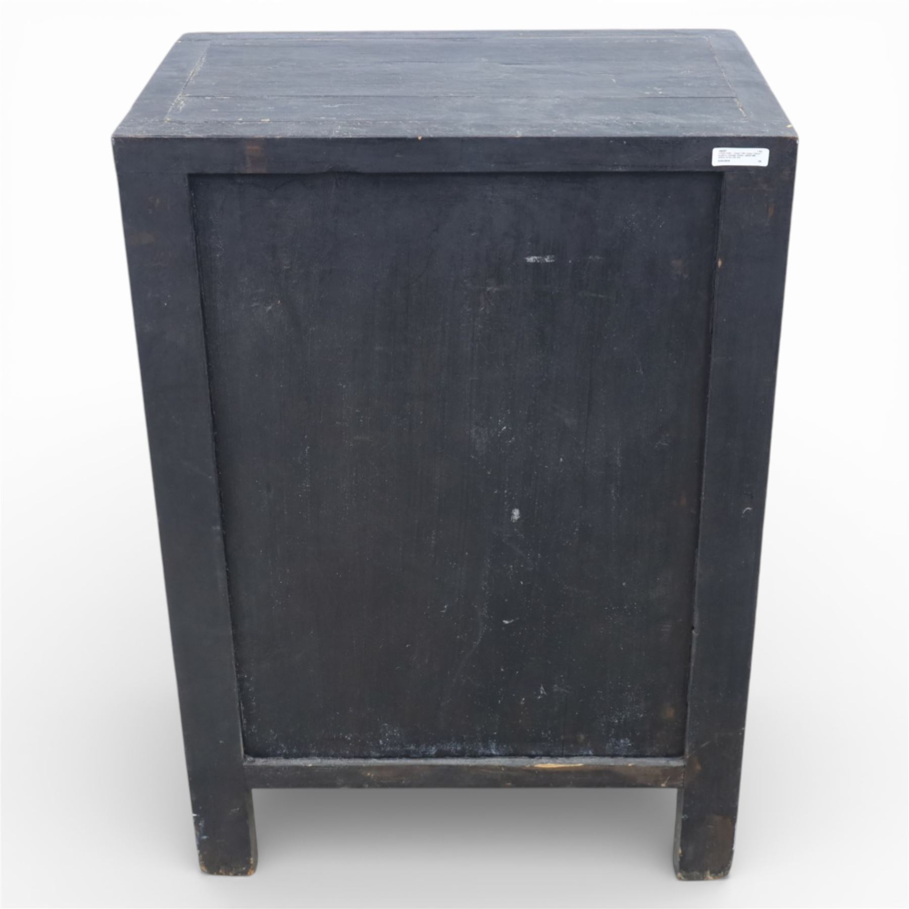 19th century Chinese black lacquer marriage cabinet, rectangular form, twin cupboard doors painted with gilt chinoiserie scenes depicting mounted figures, ritual urns and symbolic objects within patterned borders, central shaped metal lock plate with twin drop handles, lower section decorated with fruiting sprays, standing on stile supports