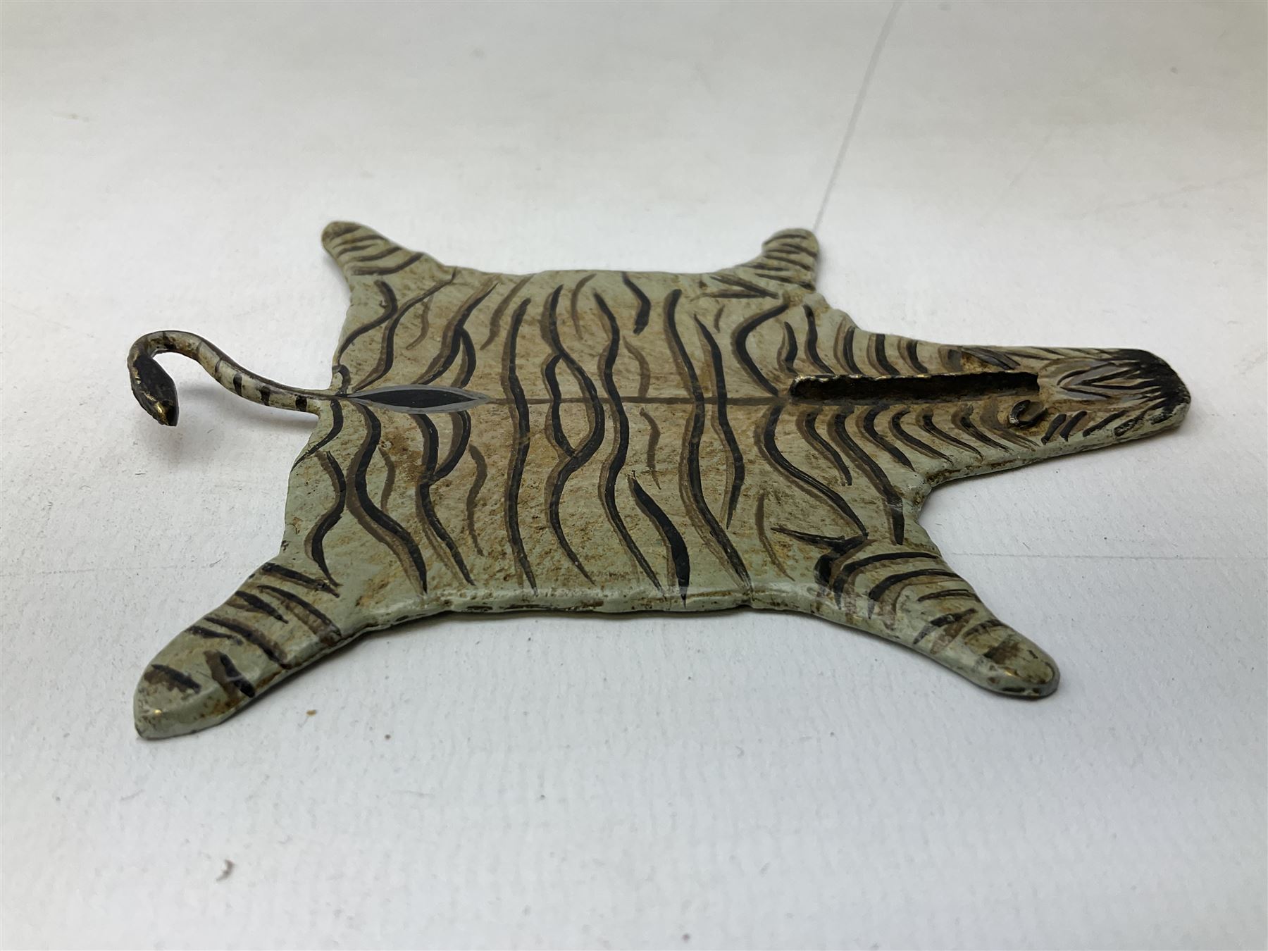 After Franz Xavier Bergman, two cold painted bronzes modelled as a crocodile skin, and a zebra skin, each stamped beneath with B within an amphora and Austria, crocodile L12.5cm, zebra 10.5cm