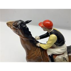 Beswick jockey on walking horse no 1037, in black white and yellow jockey colours, with printed mark beneath, H22cm