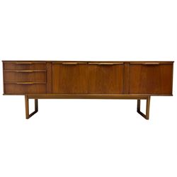 Mid-20th century teak sideboard, fitted with three drawers and two cupboards, with fall-front cabinet to the right