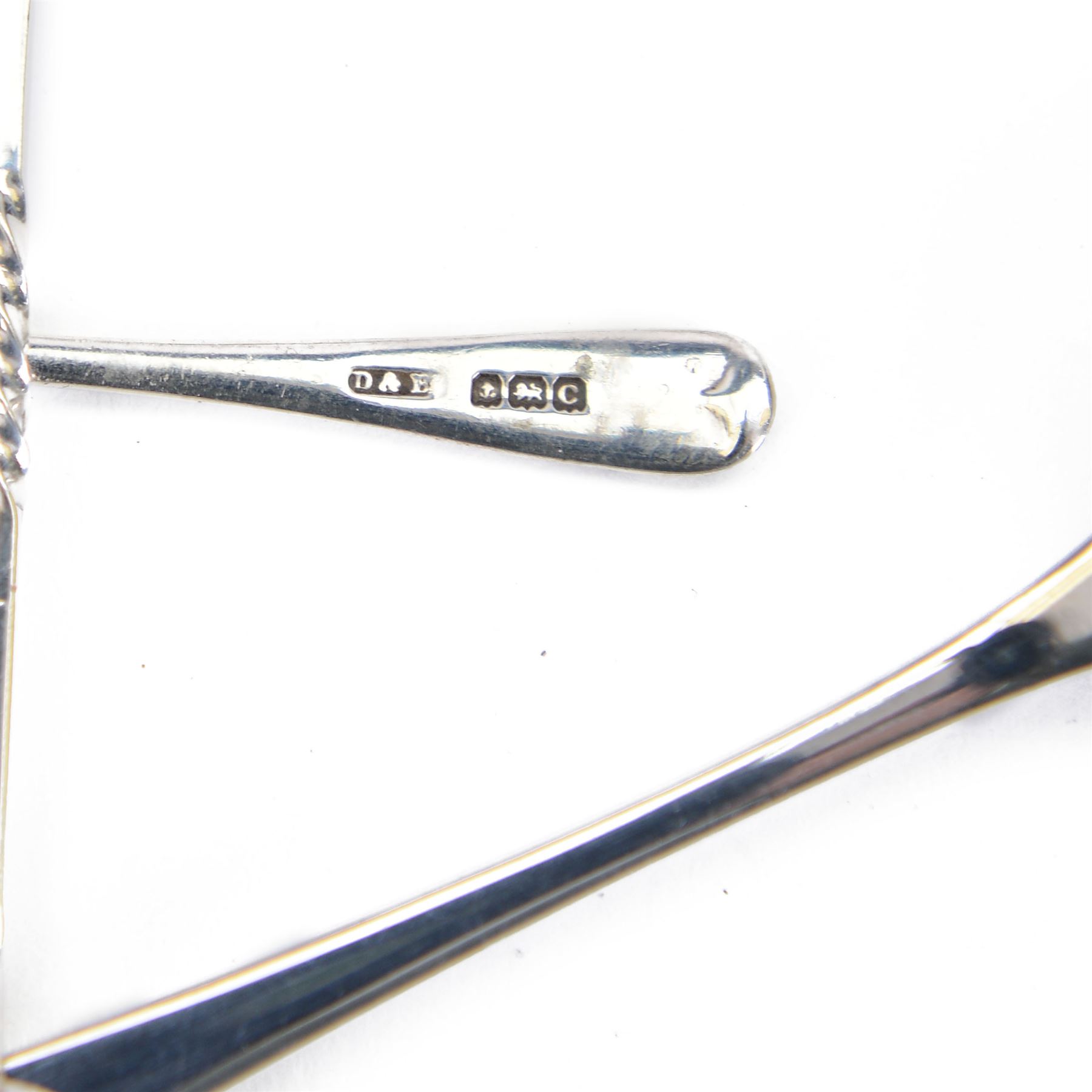 Group of silver, comprising two rectangular photograph frames, two pencil holders, boxed spoon and souvenir spoons, all hallmarked 