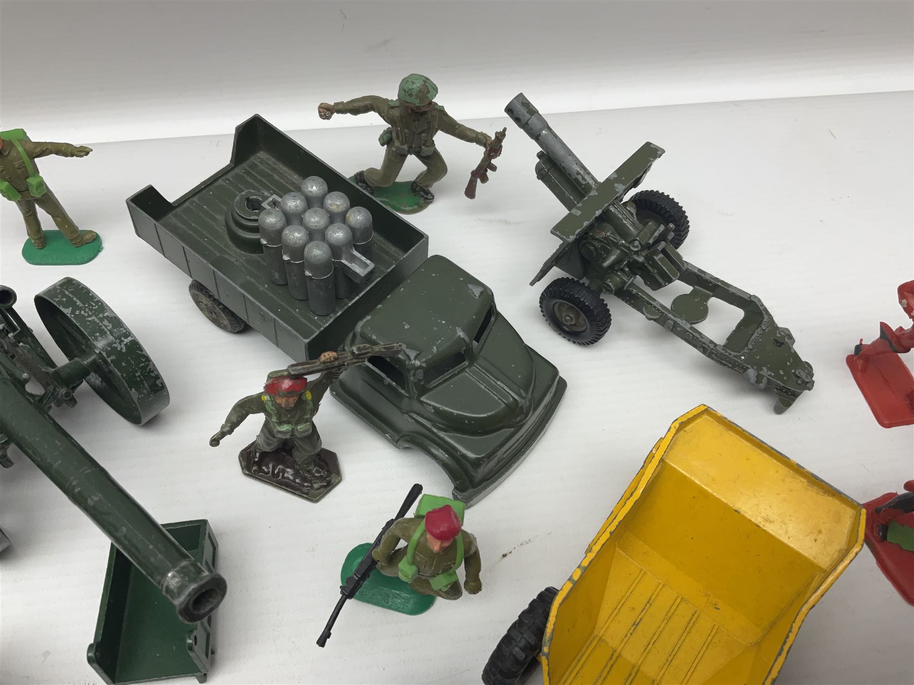 Various makers - unboxed and playworn die-cast models including Dinky Thornycroft Mighty Antar Tank Transporter No.660 and Centurion Tank No.651, other military and farm vehicles; and quantity of loose plastic soldiers and other figures by Crescent, Britains etc