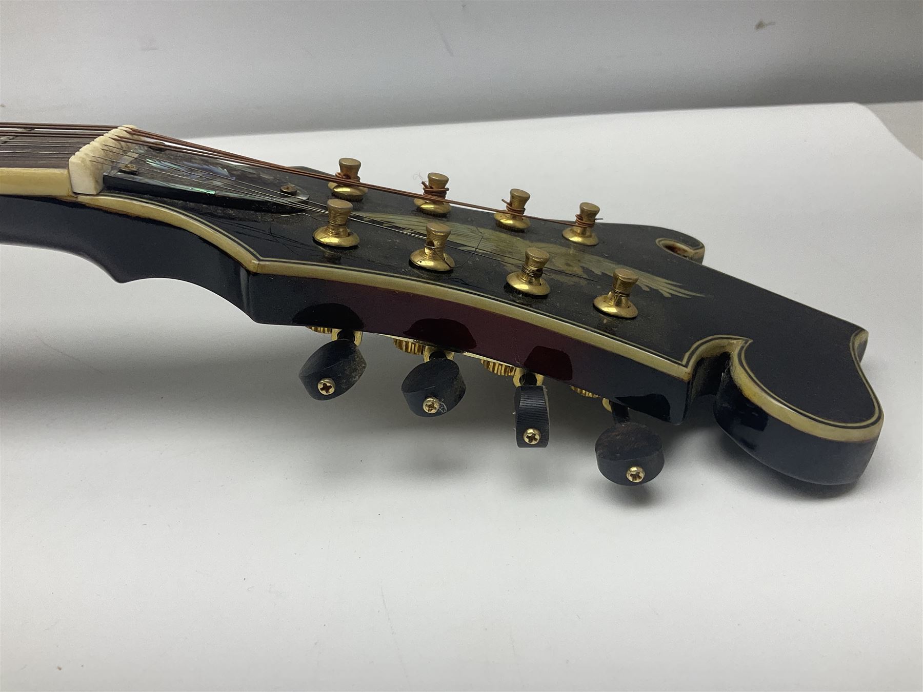 Eastern eight-string mandolin with red sunburst finish and mother-of-pearl inlay of eagles, clouds, trees etc L86cm; in fitted hard carrying case