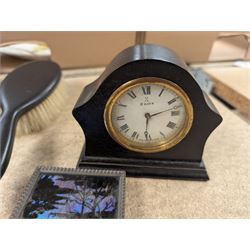Pair of silver bud vases, pair of scent bottles with silver collars, butterfly wing picture and an ebony dressing table set