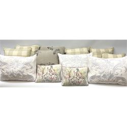 A group of twelve assorted cushions, to include five examples in beige check fabric, a pair decorated with pheasants, and a smaller pair with painted effect decoration of pheasants, etc. 