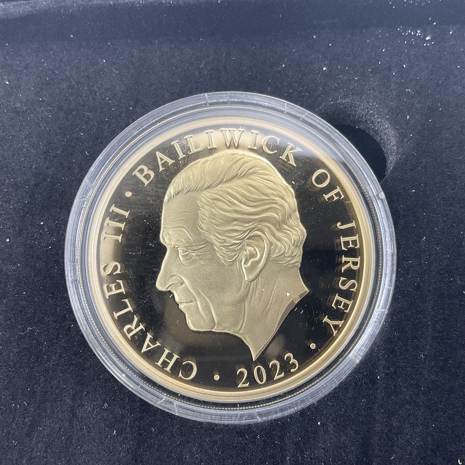 King Charles III 2023 'Coronation Silver Proof Mint Masters Set' comprising Bailiwick of Jersey, Bailiwick of Guernsey and Isle of Man sterling silver proof five pound coins, cased with certificate and Queen Elizabeth II 2019 Bailiwick of Jersey 'Remember With Us' silver two pound and five pound pair, cased with CPM certificate