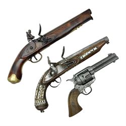 Modern non-firing reproduction Tower flintlock pistol marked with crowned GR and Tower to the lock, brass skull crusher butt and fittings L40cm overall; another Indian/Moorish reproduction flintlock pistol with mother-of-pearl inlay; and a modern die-cast replica Colt style revolver (3)