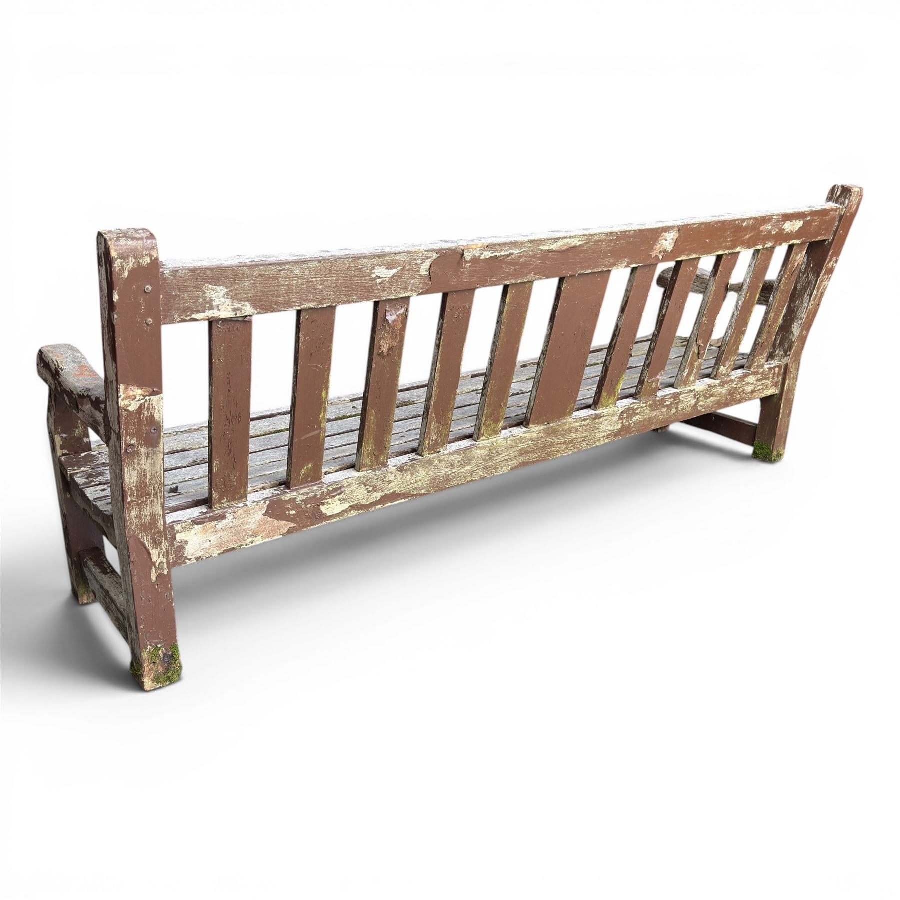 Teak garden bench with slatted back and seat on square supports in weathered which finish 