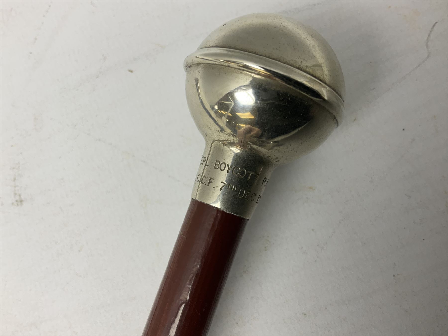 Three military swagger sticks - 14th Foot West Riding POWO Regiment; Northern Cyclist Battalion; both with regimental crests; and another with spherical terminal inscribed L/Cpl. Boycott P.M. WC. C.C.F. 7th Dec. 1960 (Combined Cadet Force?); all with plated mounts (3)