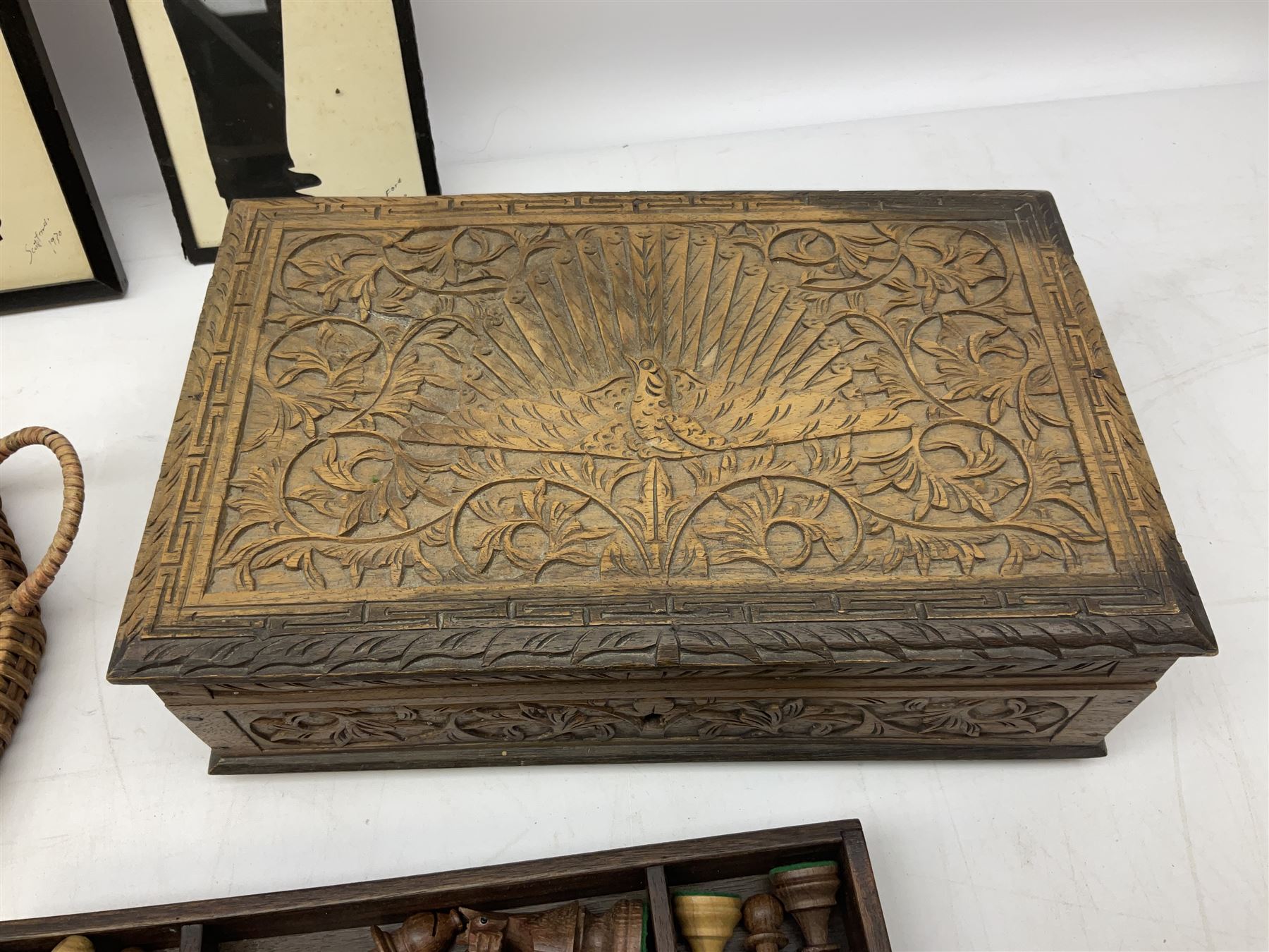 Two Scott-Ford framed silhouettes, featuring the standing profile study of a man dated 1929 and a pair of women dated 1929 and 1930, together with a box containing wooden chess pieces and a serving tray 