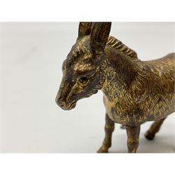 Two 19th century novelty tape measures, one the form of a donkey and the other in the form of a pig, both housing a printed tape in ins. and cm, and winding mechanism from the tail 