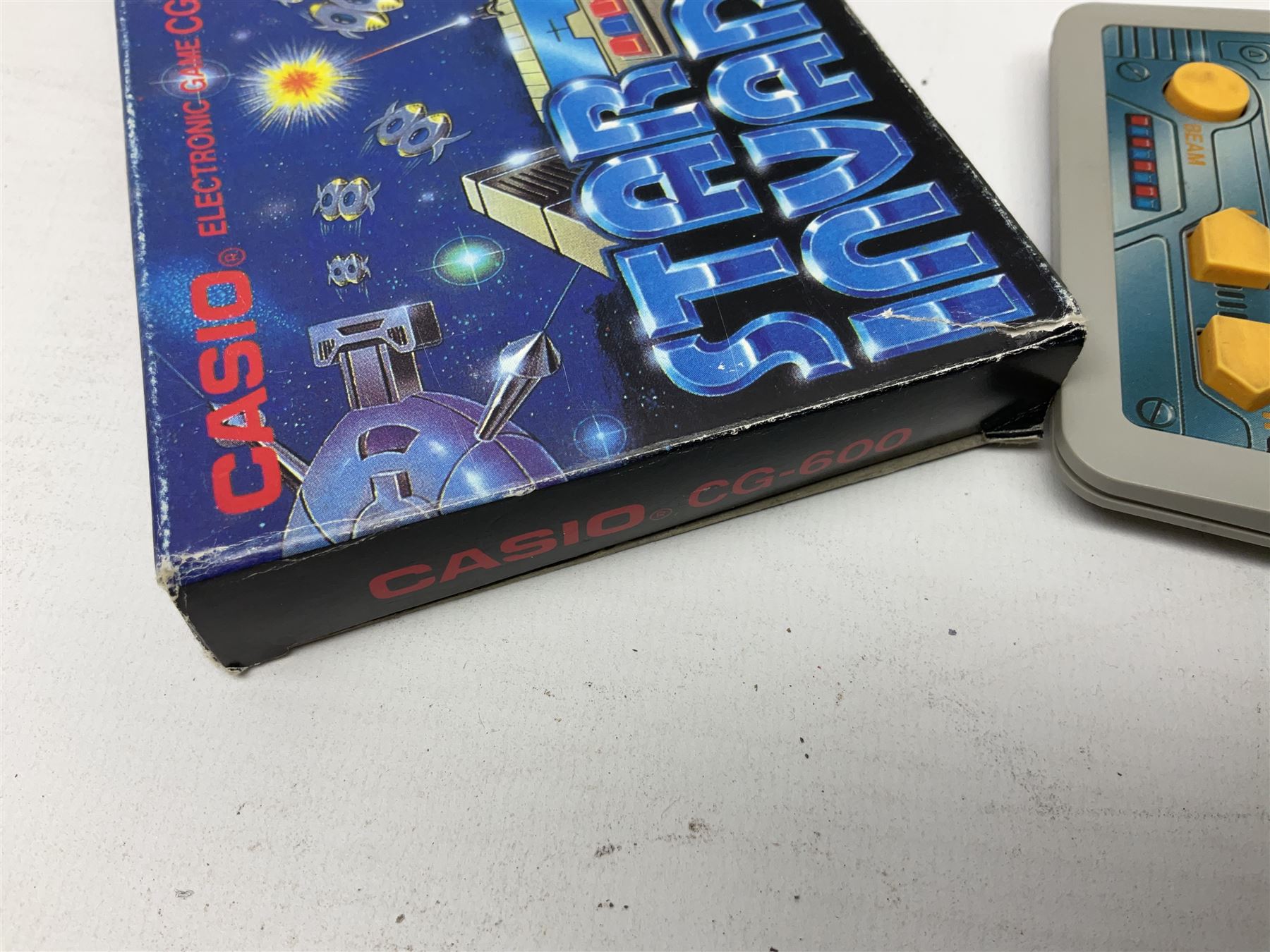 Collection of retro handheld games, including Nintendo Game & Watch ‘Snoopy Tennis’ (1982) and ‘Squish’ (1986) both with instruction booklets, Casio CG-600 ‘Star Invader’ with box, 3 in 1 LCD cartridge game including ‘Soccer’, ‘Invader’ and ‘Bomb Finder’ games, and two Grandstand ‘Pinball Wizard’ (1988) games, both with original boxes