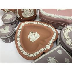 Collection of Wedgwood Jasperware, in orange, lilac and pink colourways, including oval tray, small jug, trinket boxes, trinket dishes, etc , all with impressed mark beneath